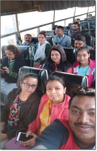 Participant  employees from various locations enjoying the bus ride to Paladi for the games and fun 